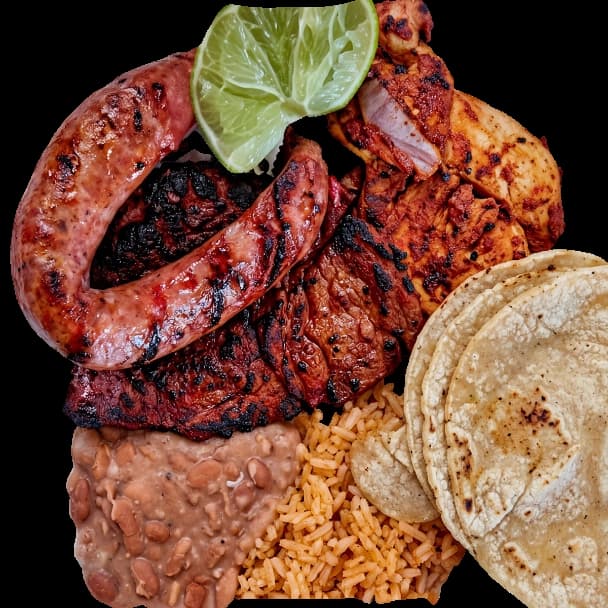 El Jefe's Platter with marinated steak, al pastor chicken breast, and pork sausage served with Mexican rice and pinto beans